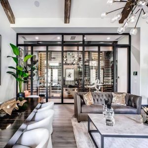 custom wine cellar in house with glass door and refrigeration system 01